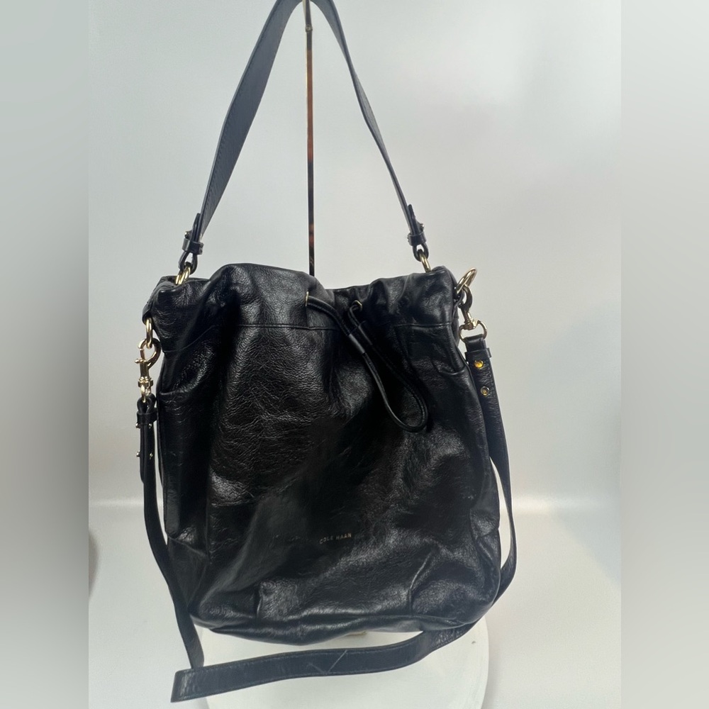 100% leather like new Cole haan black purse